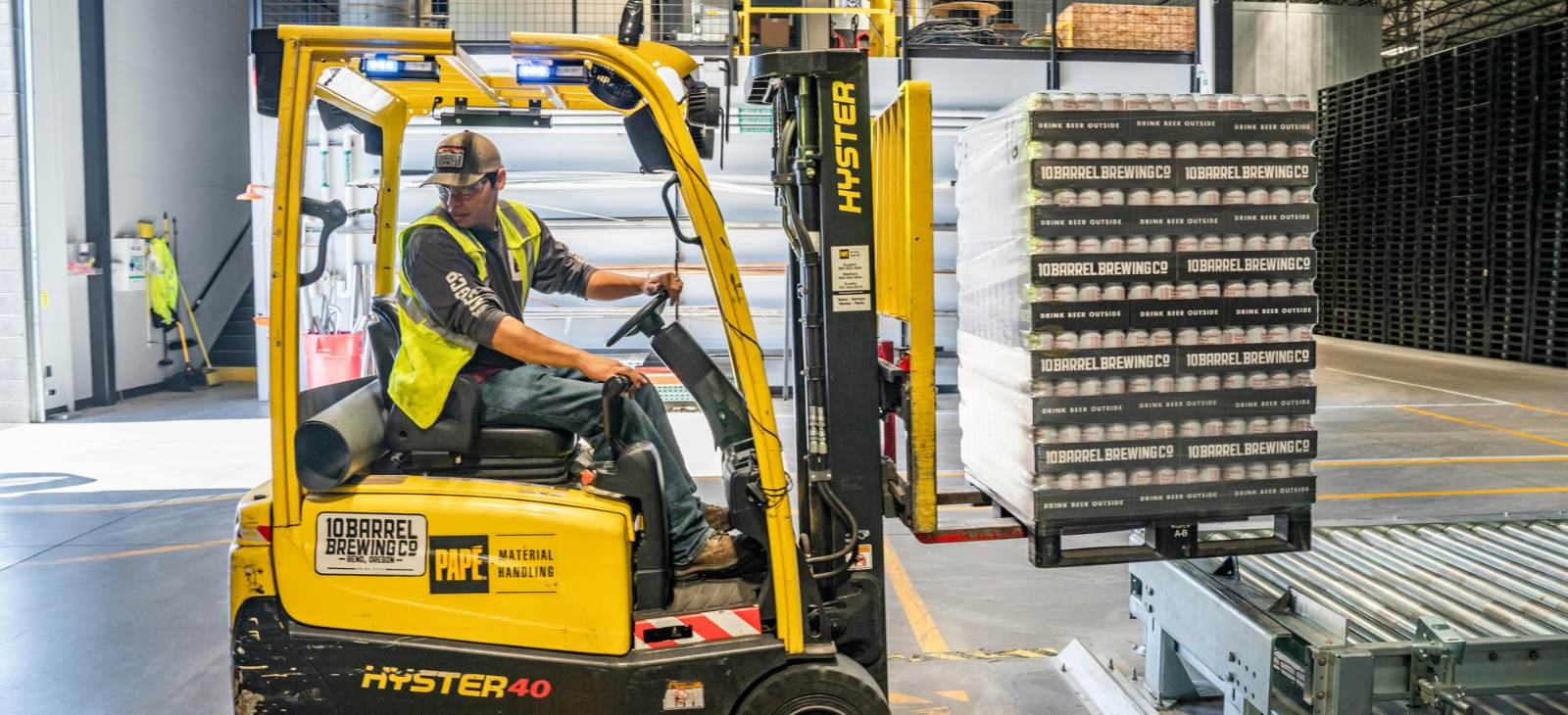 Warehouse lift operator at work