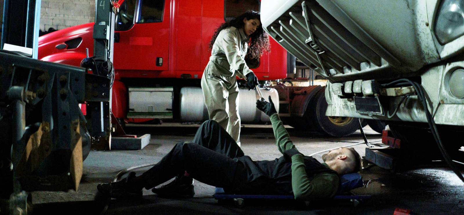 Diesel mechanic servicing a truck